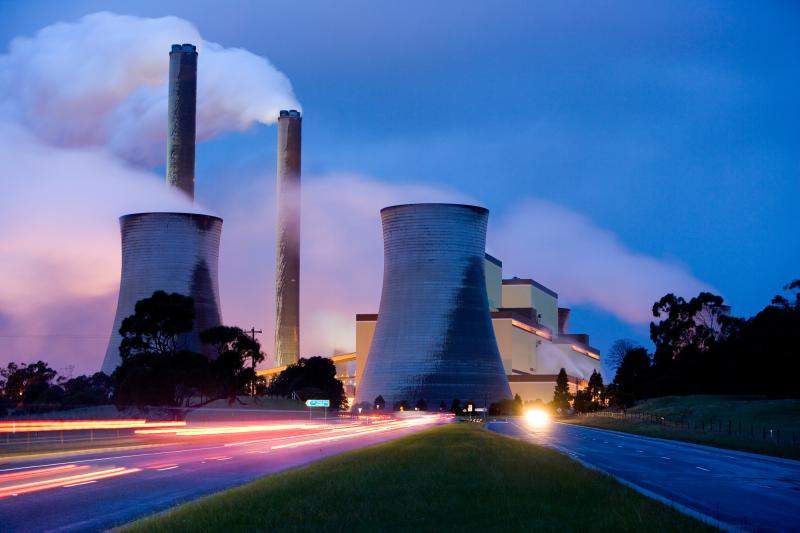 A timelapse picture of an industrial power plant.